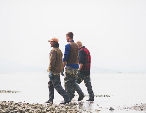 three-fishermen-walking-beach.jpg